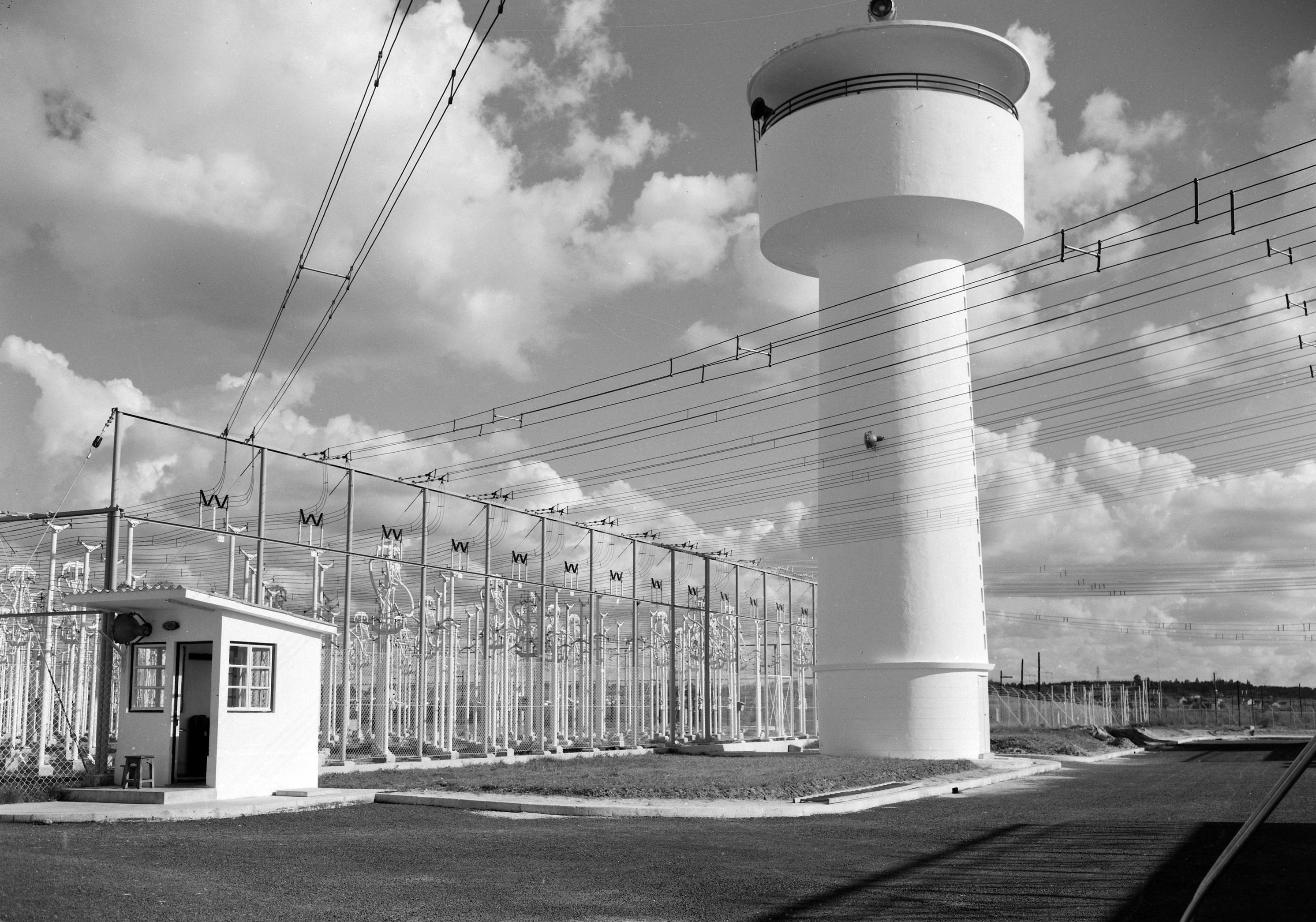 Radio transmitter against a cloudy sky